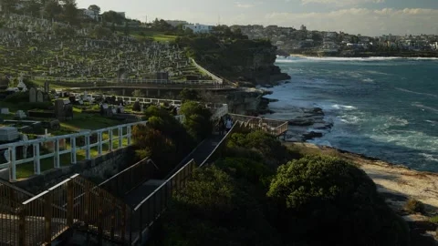 People use Bronte cliff top walkway in Sydney zoom out 4K Video stock 310159256