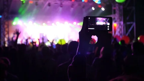 People use smart phones record video at music concert Stock Footage 80417231