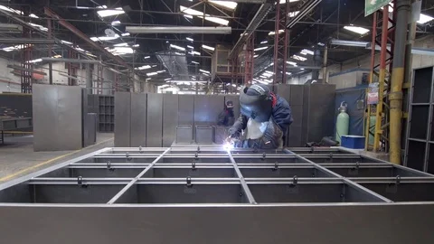 People using a blowtorch on a factory 動画素材 75167289