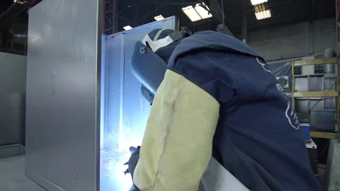 People using a blowtorch on a factory 動画素材 75167350