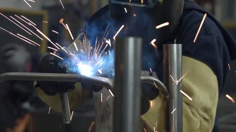 People using a blowtorch on a factory 動画素材 75167383