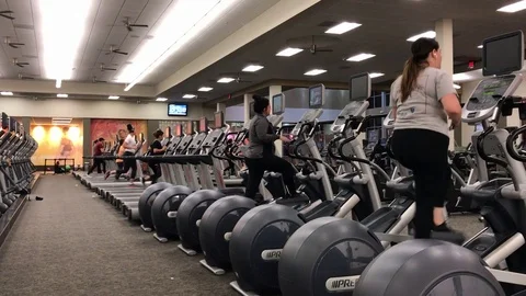 People Using Cardio and Treadmill Machines Stock Footage 91058249