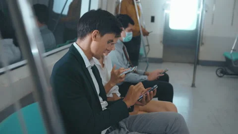 The people is using cell phone in public metro train , people lifestyle in ur Vídeos de archivo 150502742
