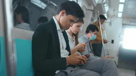 The people is using cell phone in public metro train , people lifestyle in ur Vidéo 150502808