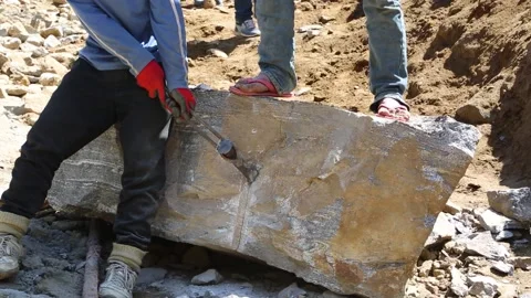 People using Chisel and Hammer to Break the Rock 動画素材 145539575