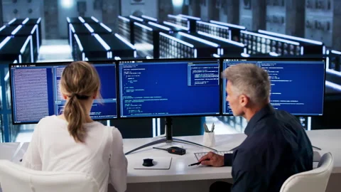 People Using Computers In Data Center Room Stock Footage 335877005