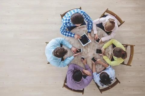 People using digital devices Stock Photos