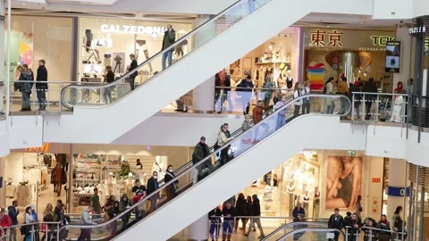 People using escalator in the mall. Stock Footage
