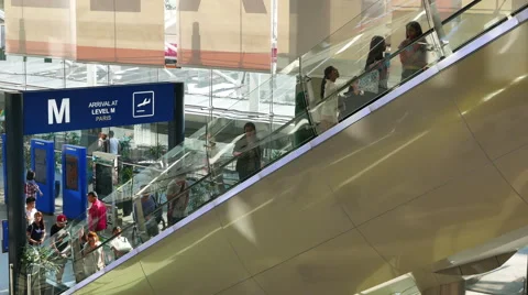 People using the escalator in Shopping Mall Stock Footage 62853545