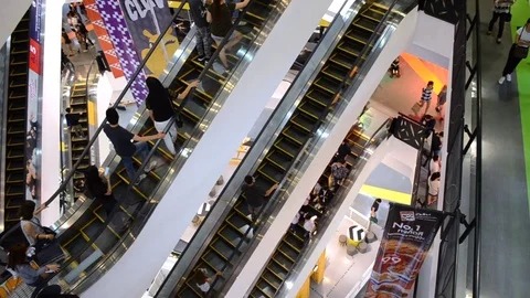 People using escalator at Union shopping mall in Bangkok Stock Footage 71365318
