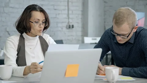People using laptop computer and testing program online Stock Footage 109210791
