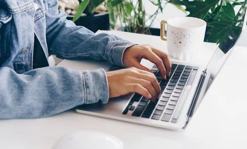People using laptop to work study on work desk. Business, financial, trade .. Stock Photos