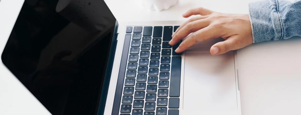 People using laptop to work study on work desk. Business, financial, trade .. Stock Photos