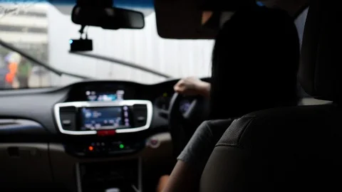 People using mobile phone inside car with traffic jam in the road city Stock Footage 94178447