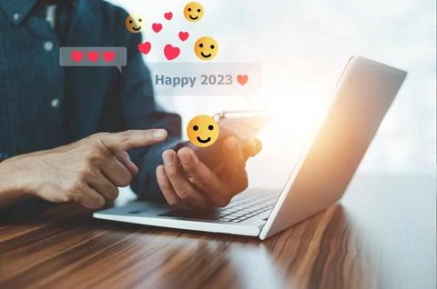 People using mobile smartphone sent message happy 2023 for happy new year c.. Stock Photos