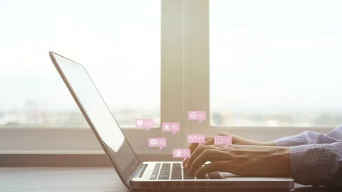 People using notebook computer laptop for social media interactions with icons Stock Footage 131752752