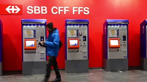 People using SBB ticket machine at Switzerland station with public transport Stock Footage 321706848