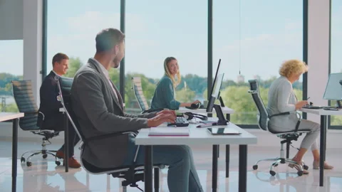 People using shared office in company Stock Footage 164556125