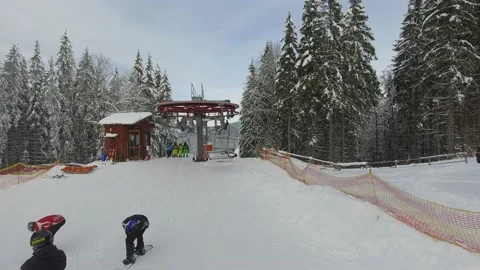 People using ski lift in mountains Stock Footage 149059651