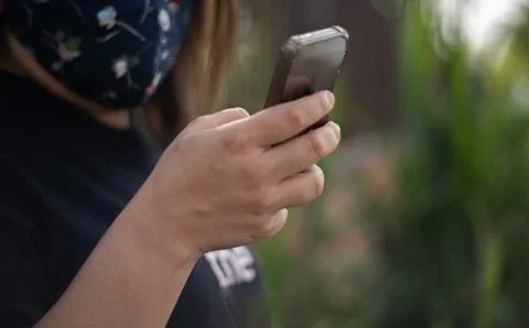 People using smart phone checking news corona virus. 스톡 사진