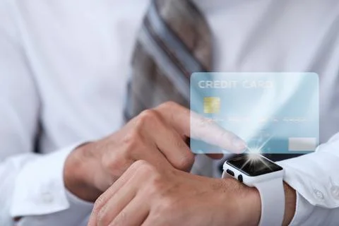 People using smart watch for payment credit card with technology Stock Photos
