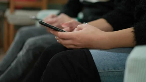 People using smartphone apps compulsively at home,social network tech addicted Stock Footage 167775624