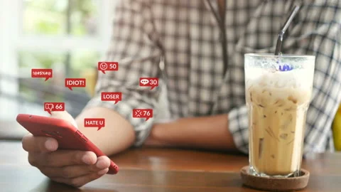 People using smartphone with notification of mean comment in social network. Stock Footage 132653501