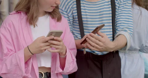 People using smartphone. Visual content photos and videos memory preservation. Stock Footage 250023101