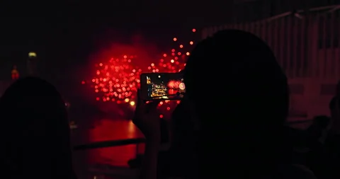 People using smartphones to capture video Hong kong national day fireworks 2018. Video stock 201094625