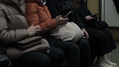 People using smartphones while traveling. Stock Footage 236356717