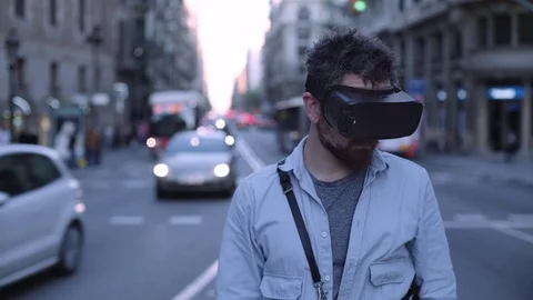 People using vr headset outside 스톡 동영상 75585620