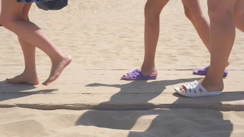 People on vacation go to the beach. Many people, sand, sea. Stock Footage 114635016
