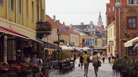People in Vilnius street in the old town of Kaunas, summer, editorial  Stock Footage