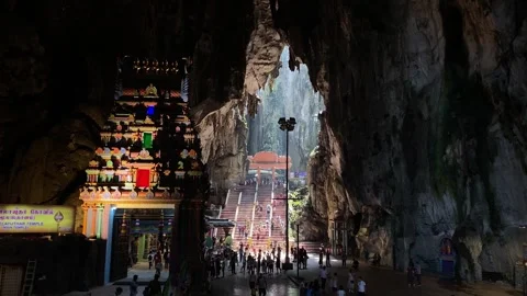 People visit the Batu Caves temple in Kuala Lumpur, Malaysia 4K Stock Footage 247620105