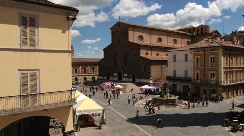 People visit the central square of the city in Faenza, Italy. Video stock 59794135