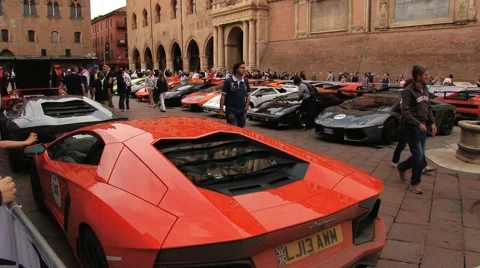People visit exposition of Lamborghini cars at the square in Bologna, Italy. Video stock 59791120