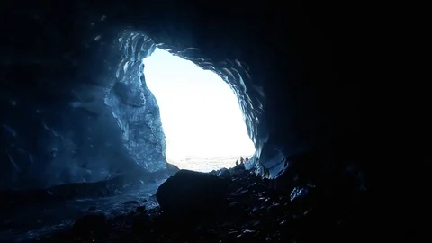 People visit an ice cave Stock Footage 84651467