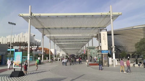 People visit mobility district at Expo 2020 Dubai, UAE Stock Footage 182081360