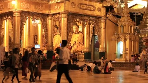 People visit the Shwedagon Pagoda at night , Yangon, Myanmar. Burma Stock Footage