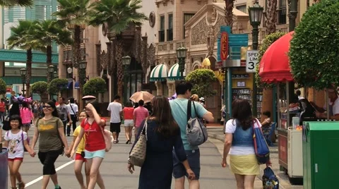 People visit Universal studio theme park at Sentosa island, Singapore. Stock Footage 62073119