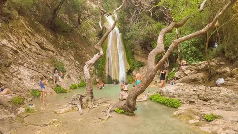 People visiting the beautiful waterfall of Neda in Greece. Stock Footage 84830277