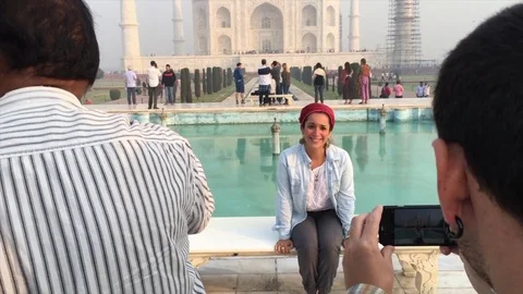 People visiting Taj Mahal in Agra, India Stock Footage
