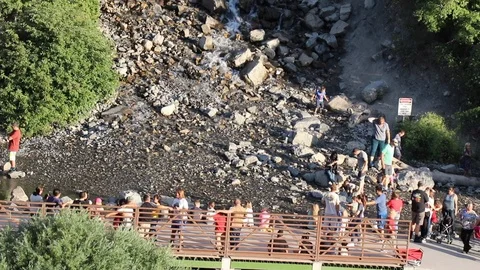 People Visiting a Waterfall Stock Footage 94221588
