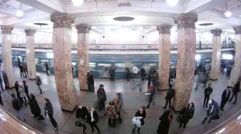 People wait and leave by train in subway at station Komsomolskaya Stockbeeldmateriaal 10808365