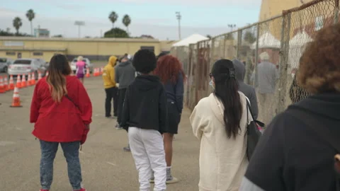 People wait in line to be tested for covid-19 Video stock 143430197