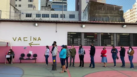 People wait in line for a dose of COVID-19 vaccine in Sao Paulo, Brazil 4K Stock-Footage 157128426
