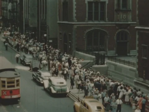 People wait in long queue to purchase newspapers during strike - 1945 Stock Footage 112200668