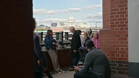 People wait in The Queue to see the Queen laying in state Stock Footage 215939618