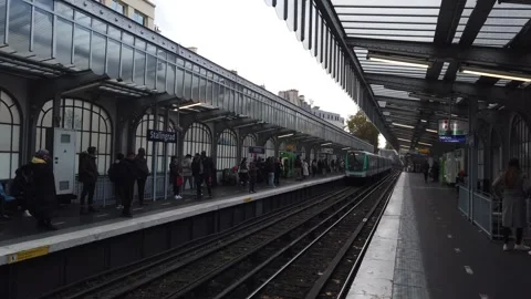 People Wait for Train Arriving to Paris Metro Outdoors Stalingard Rail Stock Footage 255119749