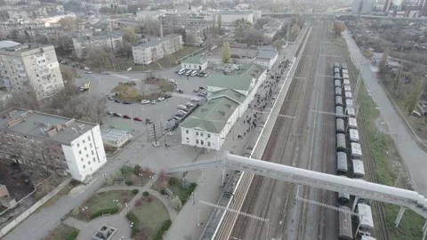 People waiting for the arrival of the train at the station Stock Footage 219686704